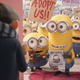 A young Gru (Steve Carrell) surrounded by the Minions in Minions: The Rise of Gru.